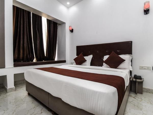 Red inn : photo 9 de la chambre deluxe double room with bath - indian nationals only