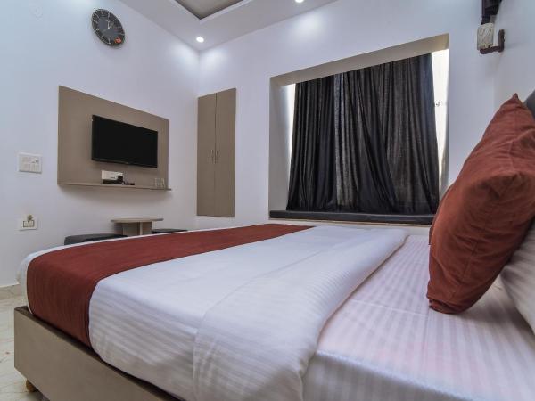 Red inn : photo 1 de la chambre deluxe double room with bath - indian nationals only