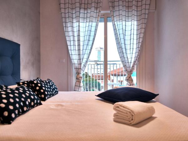 Hotel Concordia : photo 4 de la chambre chambre double ou lits jumeaux deluxe avec balcon - vue latérale sur mer