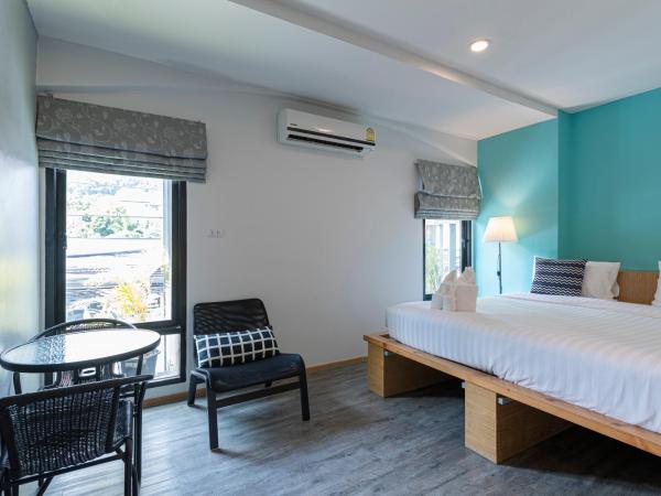 Pakta Phuket - SHA PLUS : photo 2 de la chambre chambre double ou lits jumeaux deluxe - vue sur ville 