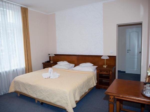 Hotel Baden : photo 6 de la chambre chambre quadruple