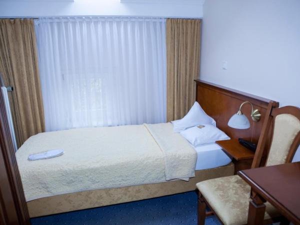 Hotel Baden : photo 2 de la chambre chambre simple avec salle de bains extérieure privative