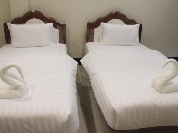 Naiya Place : photo 1 de la chambre chambre lits jumeaux standard