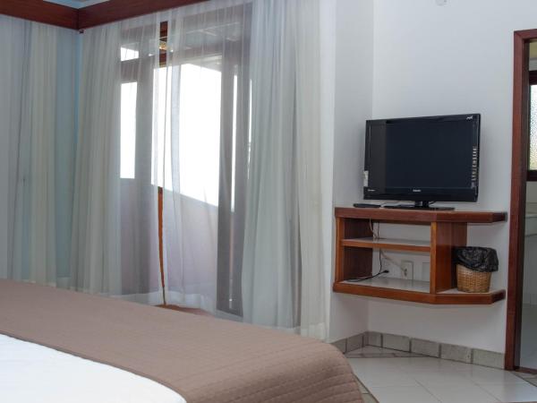 Colonna Galapagos Garden Hotel : photo 9 de la chambre suite principale avec baignoire spa - vue sur mer (2 adultes)