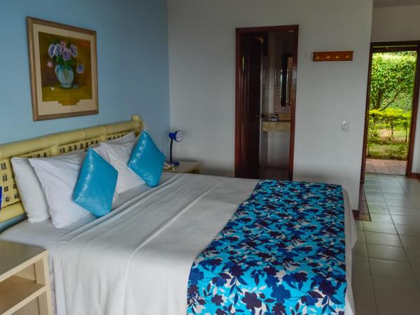 Colonna Galapagos Garden Hotel : photo 3 de la chambre chambre double deluxe - vue sur mer