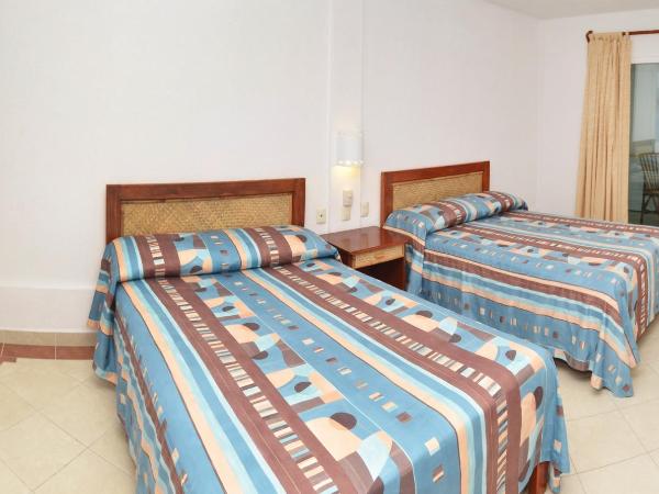 Hotel Suites Ixtapa Plaza : photo 1 de la chambre hébergement standard supérieur 