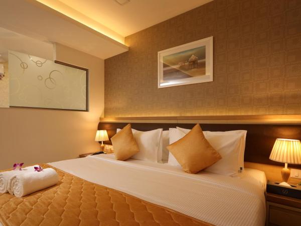 Flora Charishma Residency Aluva : photo 3 de la chambre grande chambre double