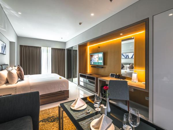 Oakwood Hotel & Residence Surabaya : photo 4 de la chambre chambre lits jumeaux supérieure