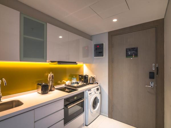 Oakwood Hotel & Residence Surabaya : photo 4 de la chambre studio lits jumeaux deluxe