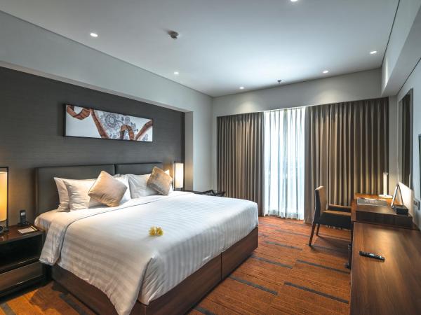 Oakwood Hotel & Residence Surabaya : photo 2 de la chambre hébergement 1 chambre premier