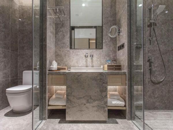 Chongqing Liyuan Hotel : photo 2 de la chambre chambre lit king-size de luxe - vue sur ville - fumeurs