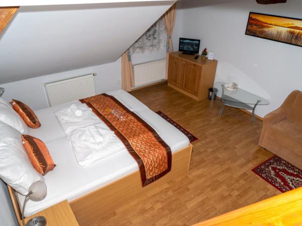 Sunshine Pension : photo 2 de la chambre chambre familiale deluxe