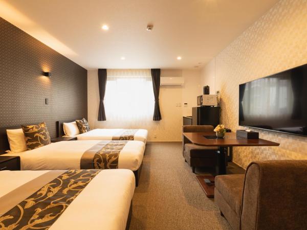 GRAND BASE Nagasaki Ekimae : photo 1 de la chambre comfort triple room - no cleaning for consecutive night stays