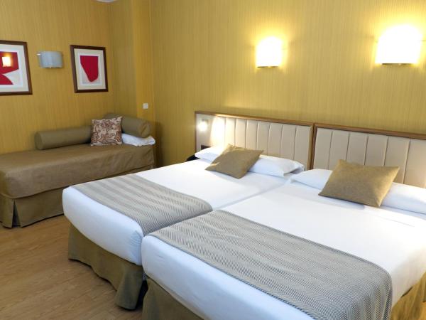 Hospedium Hotel Los Condes : photo 1 de la chambre chambre triple