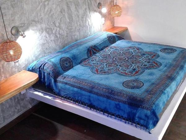 Zamunda Garden View : photo 2 de la chambre chambre lit king-size - vue sur jardin