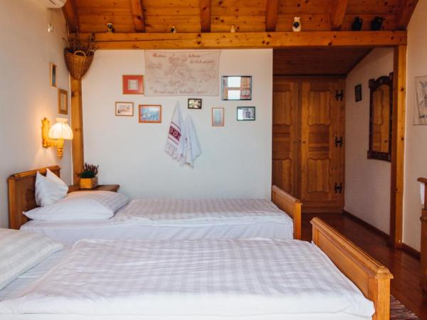 Bagoly Pincesor Fogado : photo 2 de la chambre chambre double ou lits jumeaux - vue sur ville