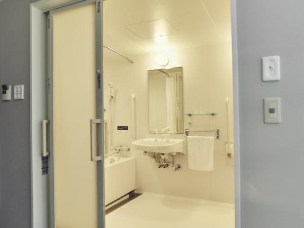 Hotel It Osaka Shinmachi : photo 2 de la chambre chambre lits jumeaux pour personnes à mobilité réduite