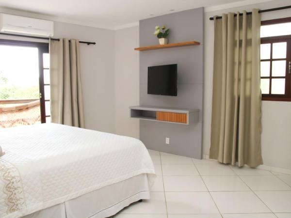 Casa Pedra Bonita : photo 9 de la chambre suite lit king-size avec baignoire spa