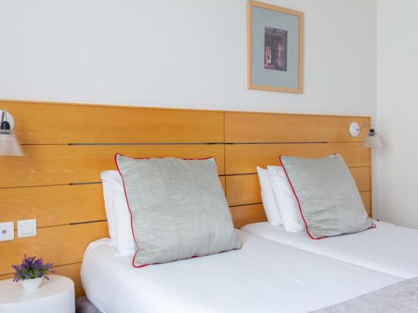 Hotel Lorette - Astotel : photo 6 de la chambre chambre lits jumeaux supérieure