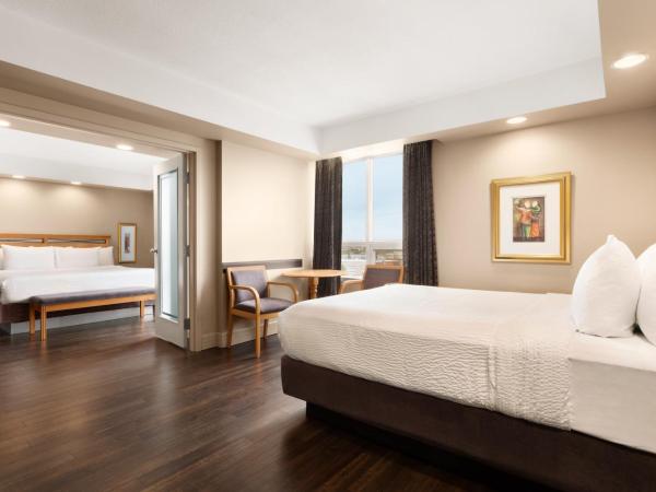 Royal Hotel Calgary, Trademark Collection by Wyndham : photo 3 de la chambre suite familiale 1 chambre avec 1 lit king-size et 1 lit queen-size - non-fumeurs