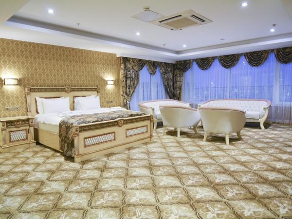 World Point Hotel Istanbul : photo 5 de la chambre suite lit king-size avec baignoire spa