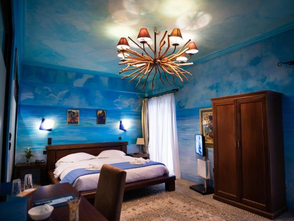 Anastazia Luxury Suites & Spa : photo 1 de la chambre suite - vue sur jardin