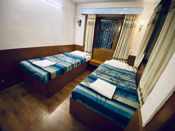 Souvenir Guest House : photo 2 de la chambre chambre lits jumeaux classique