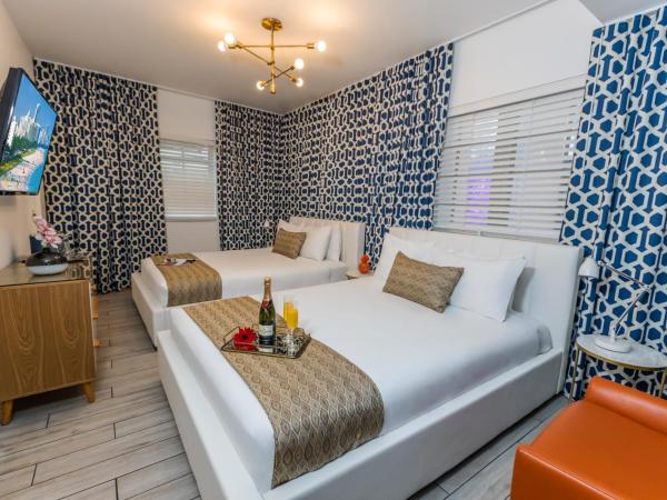 Oceanside Hotel and Suites : photo 5 de la chambre chambre avec 2 lits queen-size
