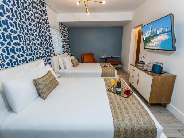 Oceanside Hotel and Suites : photo 4 de la chambre chambre avec 2 lits queen-size