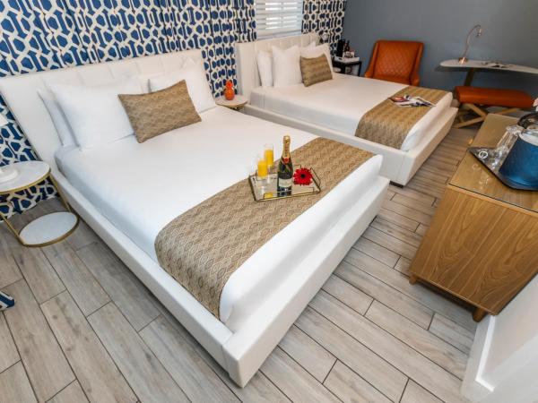 Oceanside Hotel and Suites : photo 6 de la chambre chambre avec 2 lits queen-size