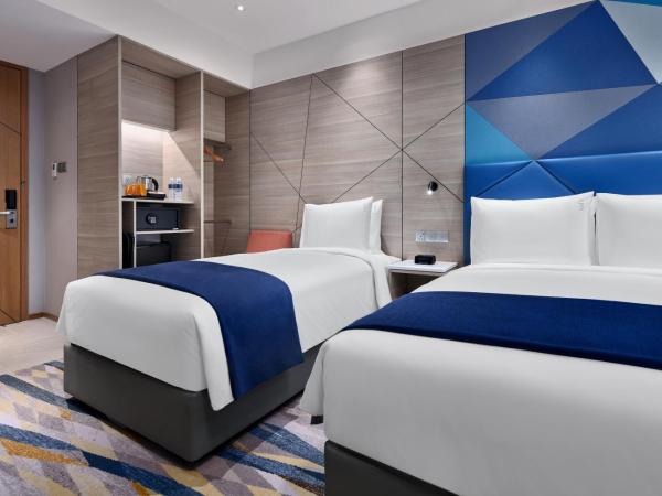 Holiday Inn Express Singapore Serangoon, an IHG Hotel : photo 4 de la chambre standard queen room with queen and single bed