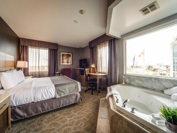 Monte Carlo Inn Airport Suites : photo 4 de la chambre suite lit king-size avec jacuzzi