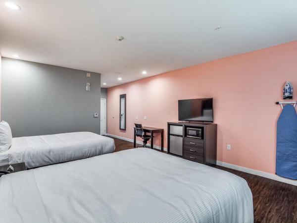 Scottish Inns & Suites Houston, TX : photo 2 de la chambre chambre quadruple