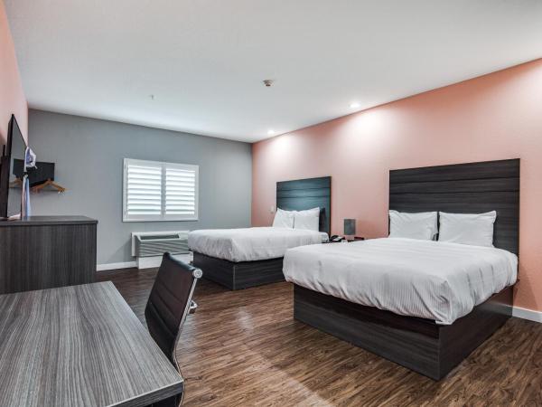 Scottish Inns & Suites Houston, TX : photo 3 de la chambre chambre quadruple