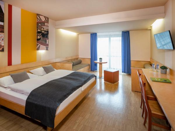 JUFA Hotel Graz City : photo 2 de la chambre chambre quadruple