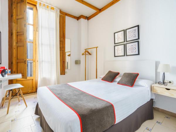 Hostal Austria : photo 3 de la chambre chambre double avec balcon