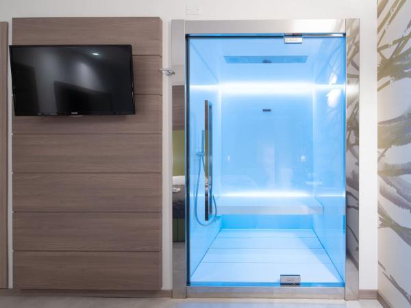 Hotel Iris ***S : photo 5 de la chambre suite avec sauna