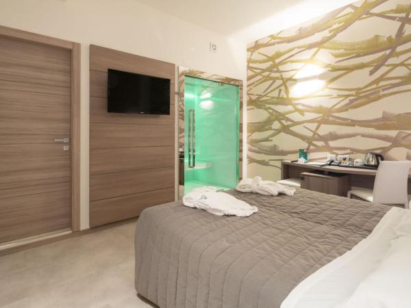 Hotel Iris ***S : photo 2 de la chambre suite avec sauna
