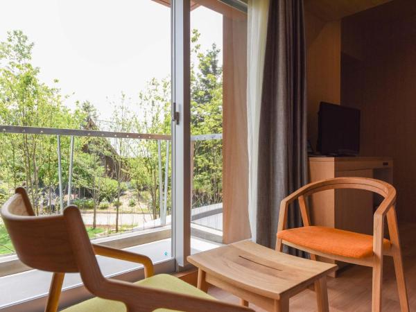 Hotel Lodge Maishima : photo 2 de la chambre chambre triple - vue sur jardin