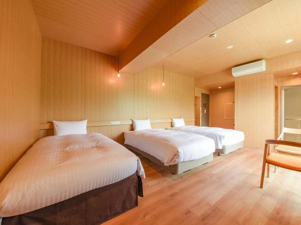 Hotel Lodge Maishima : photo 3 de la chambre chambre triple - vue sur jardin