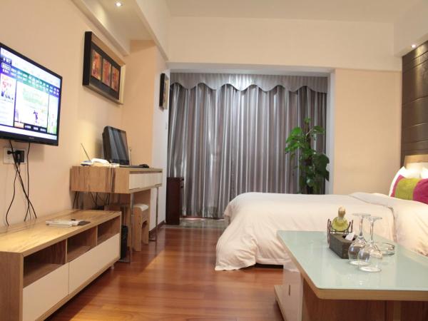 Guangzhou Victory Apartment : photo 3 de la chambre chambre lit queen-size deluxe