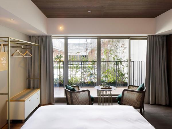 GOOD NATURE HOTEL KYOTO : photo 1 de la chambre chambre double avec terrasse et accès au salon - vue sur jardin