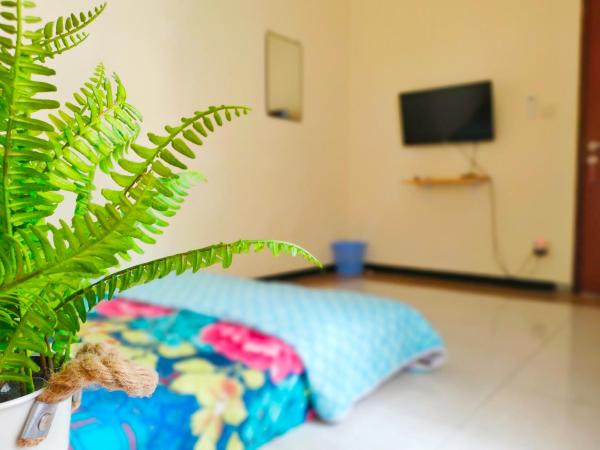 Green Surabaya Homey : photo 5 de la chambre chambre double