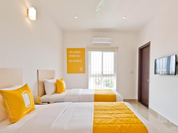 X by Bloom I Hebbal Manyata Park : photo 2 de la chambre chambre lits jumeaux deluxe