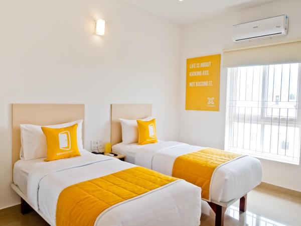 X by Bloom I Hebbal Manyata Park : photo 1 de la chambre chambre lits jumeaux deluxe