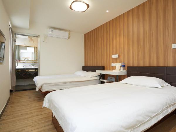 Shanghai Meego Qingwen Hotel : photo 2 de la chambre chambre familiale avec salle de bains