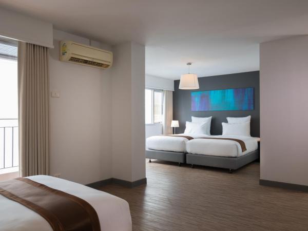 Journeyhub Pattaya Central : photo 1 de la chambre suite familiale