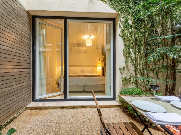 My Suite Lisbon Serviced Apartments - Principe Real : photo 7 de la chambre suite premium avec vue sur le jardin
