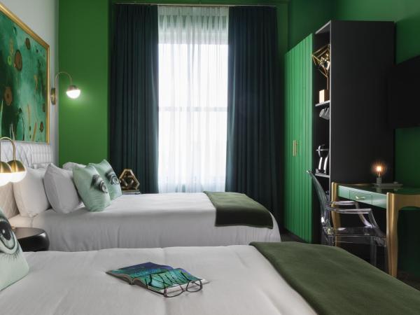 Angad Arts Hotel : photo 3 de la chambre chambre lit queen-size double - moyenne