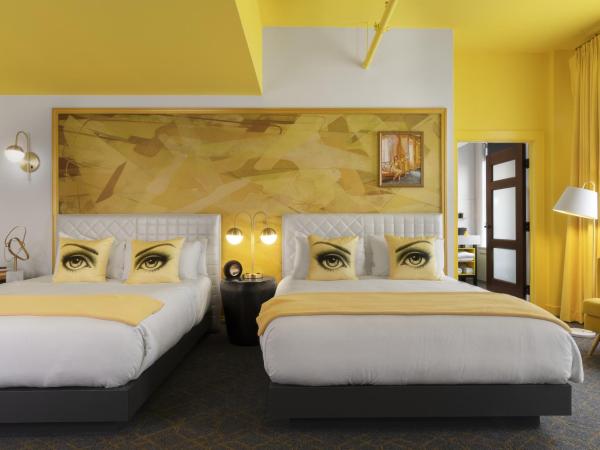 Angad Arts Hotel : photo 2 de la chambre grande chambre lit queen-size double